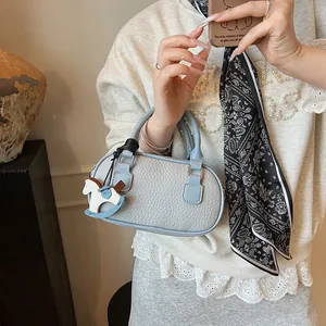 Elegant grey-blue litchi grain bowling bag with horse charm and double top handles