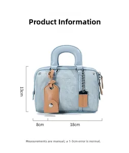 Mini blue denim Boston bag dimensions detail showing 18cm length and 13cm height