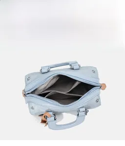 Top view of blue Boston bag showing spacious interior compartments and metal zipper