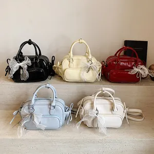 Bolsos Boston minimalistas de piel sintética con lazos de encaje de perlas en cinco colores