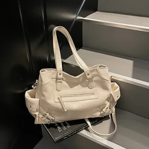 Retro cream faux leather tote bag with silver rivets and multi-pocket functional design