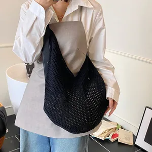 Summer woven hollow tote bag in black crochet design with stylish leather shoulder straps