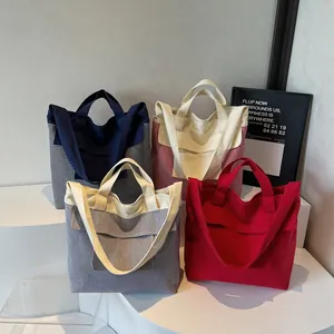 Grande borsa tote in tela con colori a contrasto e doppi manici per il pendolarismo