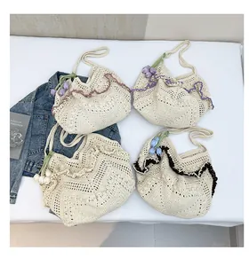 Detailed view of handmade crochet tote bags with scalloped edges and tulip charms