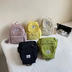 Minimalist lightweight nylon backpacks for women in five casual colors and modern style