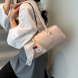 Chic pink PU leather shoulder bag with sweet cherry bow charm and slender strap