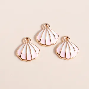 Gouden schelp bedeltjes met roze en wit kleurverloop emaille voor DIY-sieraden