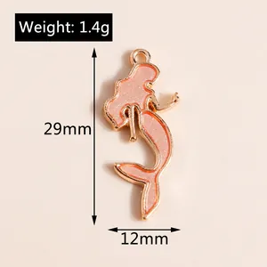 Detail of pink mermaid pendant with dimensions 29mm by 12mm and 1.4g weight specification