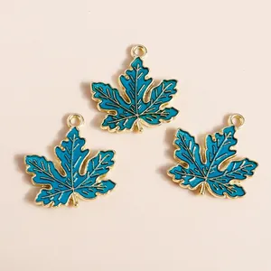 Three teal enamel maple leaf charms with golden veins for DIY jewelry making