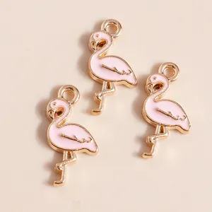 Pendentifs flamants roses en émail doré pour la création de colliers et boucles d'oreilles