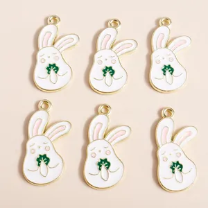 Detail showing 6 cute white rabbit alloy enamel charms with carrot for DIY jewelry