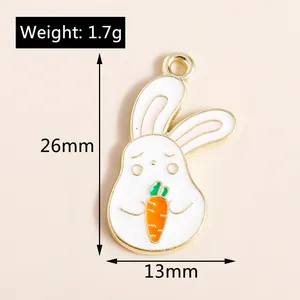 Detail of white rabbit alloy charm with carrot enamel design and 26mm height dimension