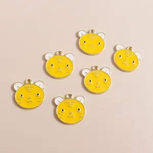 Set of six cartoon yellow tiger charms with gold enamel finish for DIY jewelry making