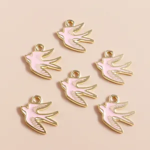 Pink and gold swallow bird charms for DIY jewelry making in a 6-piece pack set