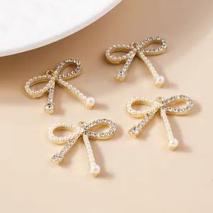Pendentif nœud doré élégant avec perles blanches et strass brillants pour bijoux DIY