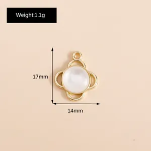 Detailed view of 17mm gold clover pendant with opal stone for jewelry DIY making