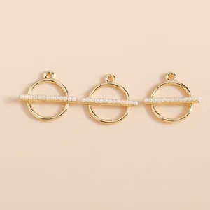 Three gold geometric round pendants with faux pearls for DIY jewelry making