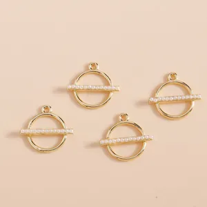 Set of 4 gold geometric hollow round pendants with faux pearl accents for DIY jewelry