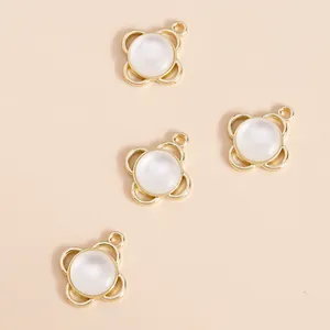 Elegant gold clover pendants with cat eye stones and pearls for DIY jewelry making