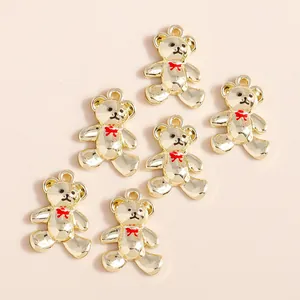 Goldene Bärenanhänger aus Legierung mit roter Schleife für DIY-Schmuck 8er-Set