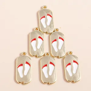 Golden rectangular footprint charms with colorful enamel drip for DIY jewelry making
