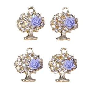 Goldener Lebensbaum-Anhänger mit lila Harzrosen und funkelnden Straßsteinen für DIY-Schmuck
