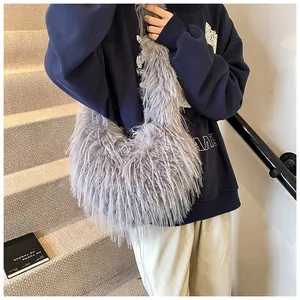 Close-up of soft gray faux fur tote bag showing plush texture and spacious casual style