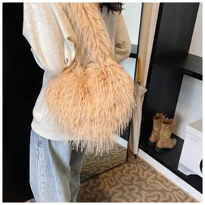 Detailed macro view of the fluffy long-pile faux fur texture on this heart tote bag