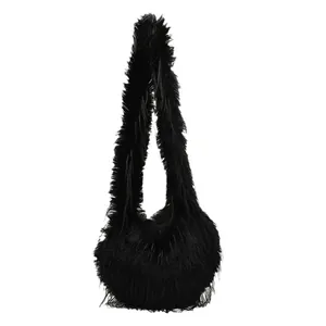 Furry heart-shaped black plush tote bag with long fluffy faux fur shoulder strap