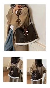 Detail of coffee brown versatile tote bag with plush trim and Lucky Day embroidery
