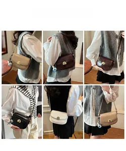 Detail showing various colors of vintage crocodile pattern saddle bags with metal buckles