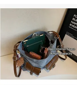 Spacious interior of blue denim tote bag filled with tablet and daily essentials