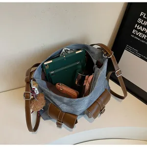 Spacious canvas tote bag interior showing capacity for tablets and daily essentials