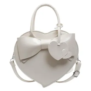 Elegante borsa a forma di cuore in pelle PU color crema con fiocco e tracolla regolabile