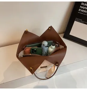 Top view of large patchwork tote bag showing spacious interior with daily essentials