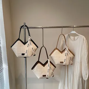 Bohemian straw tote bags with V-shaped opening and elegant faux leather trim