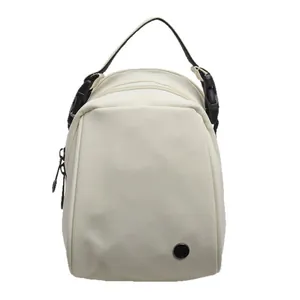 Modern minimalist off-white shoulder bag with black strap and secure buckle closure