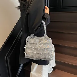 Bolso de punto calado plateado con bolsa interior con cordón para vacaciones de playa