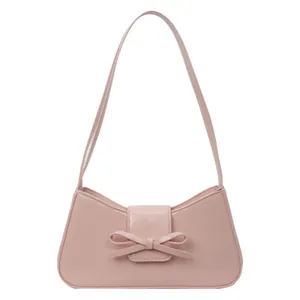 Chic pink PU leather underarm bag for women with a stylish bow decoration on front