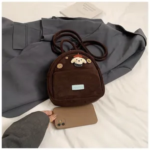 Mini brown corduroy backpack with cute puppy patch and wooden button detail