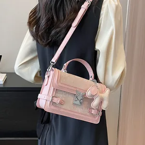 Pink PU leather crossbody bag with jacquard detail and cute dog charm for women