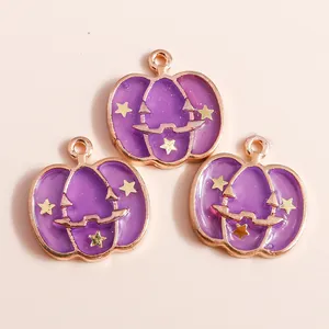 Three purple enamel pumpkin charms with gold stars for Halloween DIY jewelry making