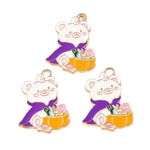 Halloween bear charms with purple cloak and pumpkin candy bucket for DIY jewelry
