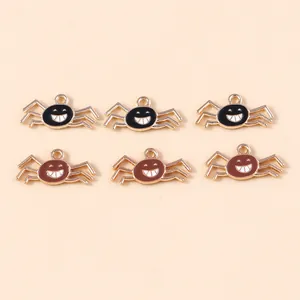 Detailed view of DIY spider charms with golden alloy plating and colorful enamel finish