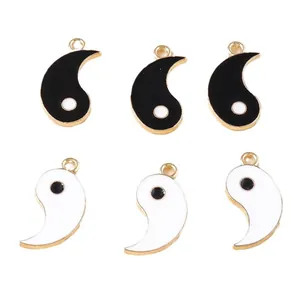 Set of 6 Tai Chi Yin Yang pendants in black and white enamel with gold-plated metal edges