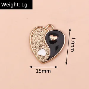 Macro detail of yin yang heart pendant with 17mm height and 15mm width dimensions