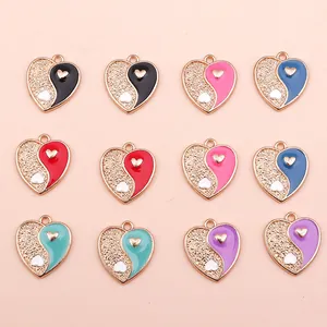 DIY heart-shaped Tai Chi yin yang pendants with metal frames in multiple colors