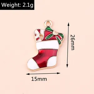 Detail of Christmas stocking pendant with candy cane, dimensions 26mm x 15mm, 2.1g weight