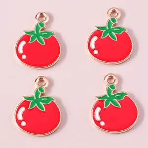 Miniature tomato charms with red enamel and gold alloy finish for DIY jewelry crafts