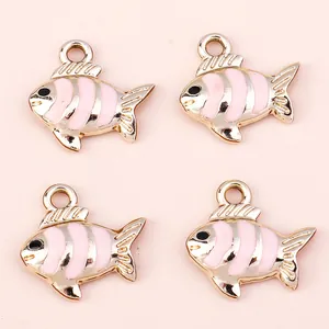 Golden fish alloy pendants with pink enamel and top rings for DIY jewelry making